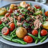 Beautifully arranged Simple Niçoise Salad showcasing colorful ingredients on a platter.