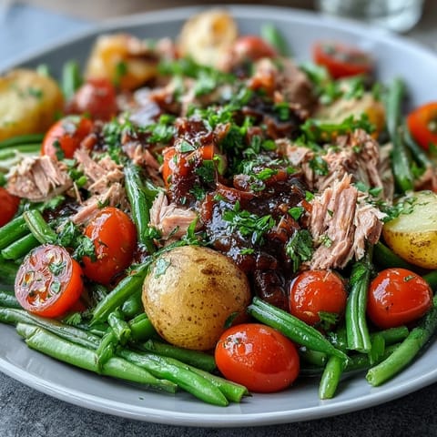Beautifully arranged Simple Niçoise Salad showcasing colorful ingredients on a platter.